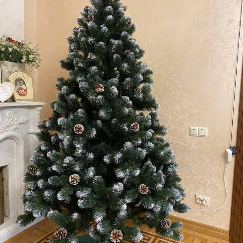 CHRISTMAS WONDER kunstkuusk kamina ääres